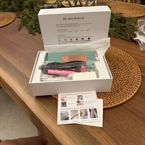 IPL Hair Removal Device in Teal and Pink